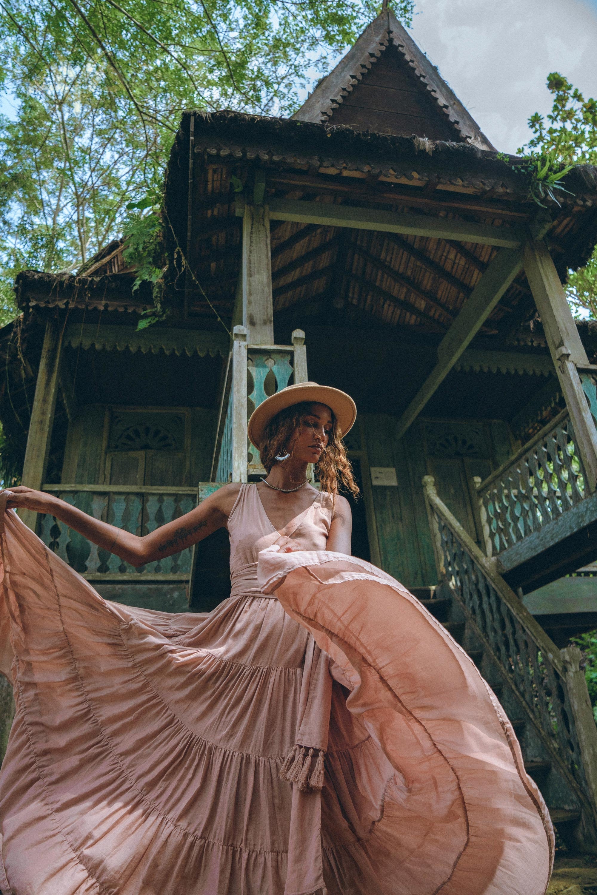 Bohemian Tiered Maxi Dress with Deep V Neck and Tassel Sash