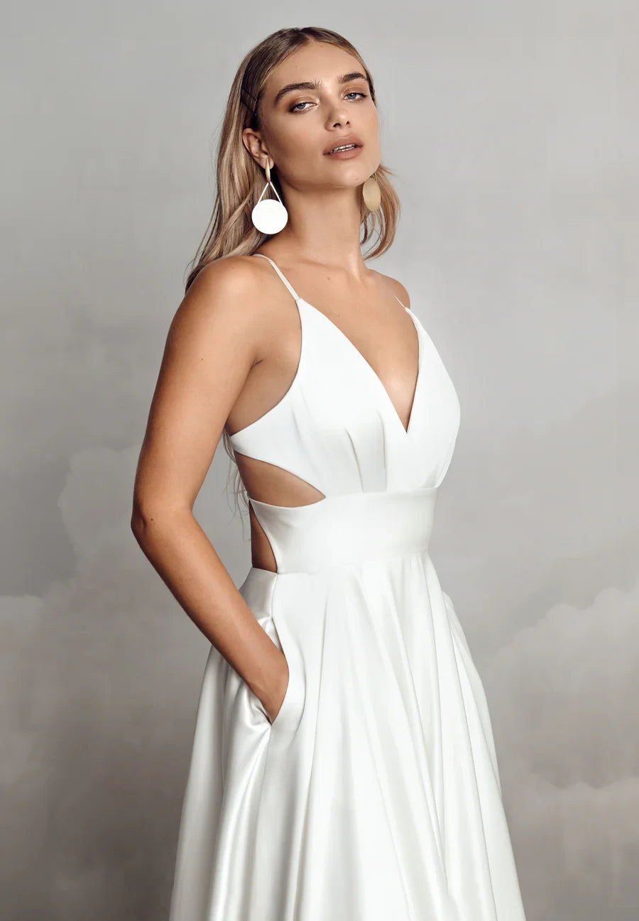 Elegant A-Line Plunging V-Neck Sleeveless Criss-Cross Back Floor-Length Wedding Dresses with Side Cutouts and Pockets
