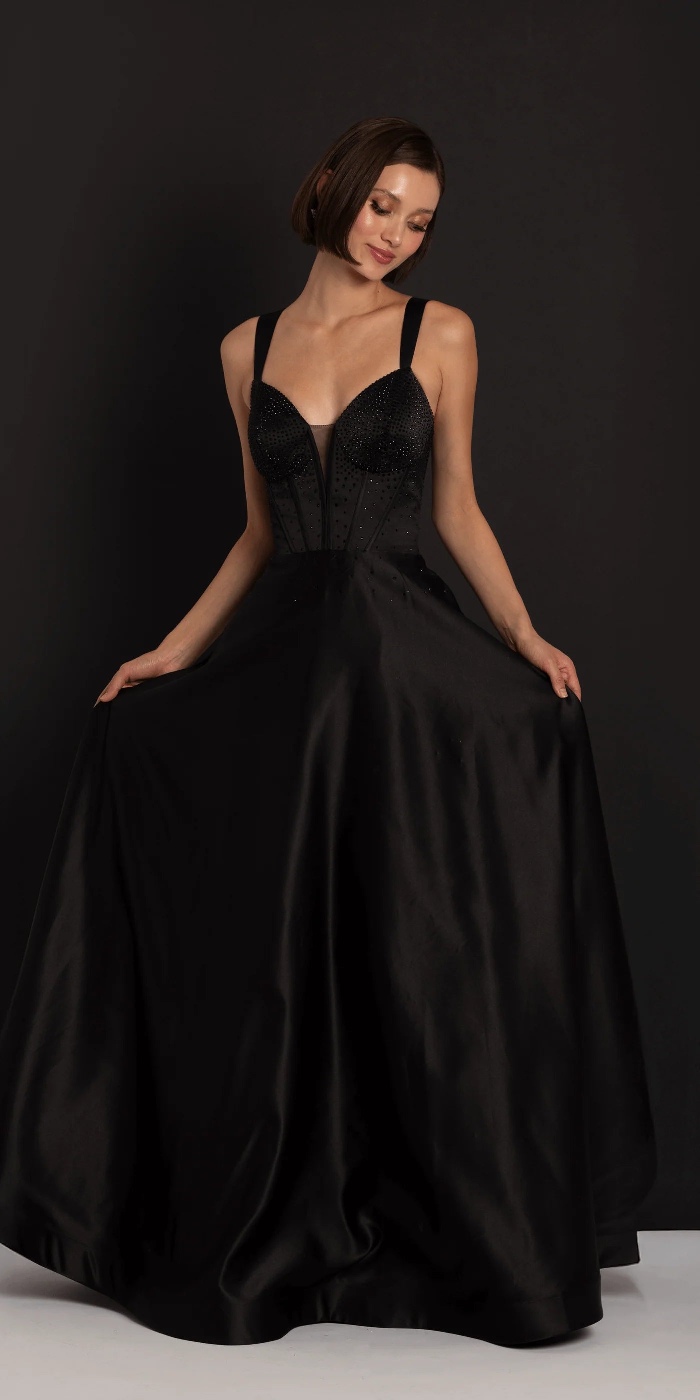 Glamorous beaded corset evening gown with satin ball gown skirt, lace-up back and pockets