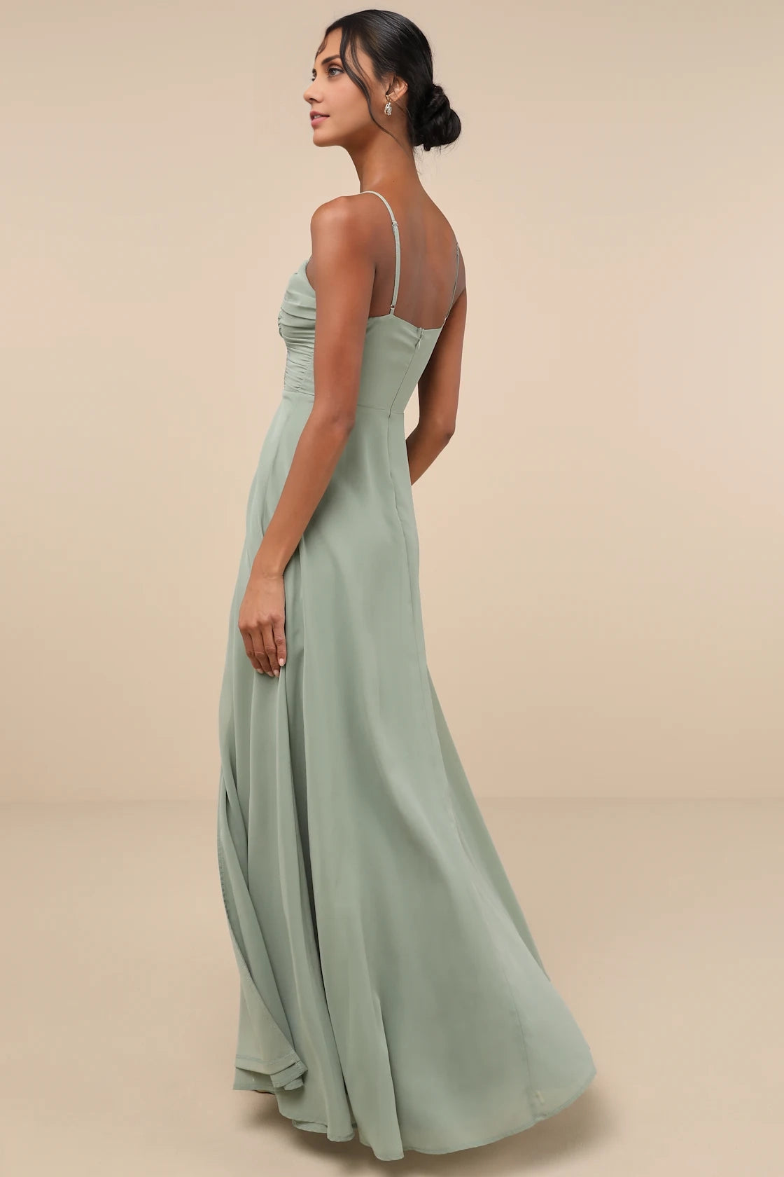 LANQI's playful A-line skirt with sheer chiffon sleeveless upper and slightly wrinkled Homecoming Dresses