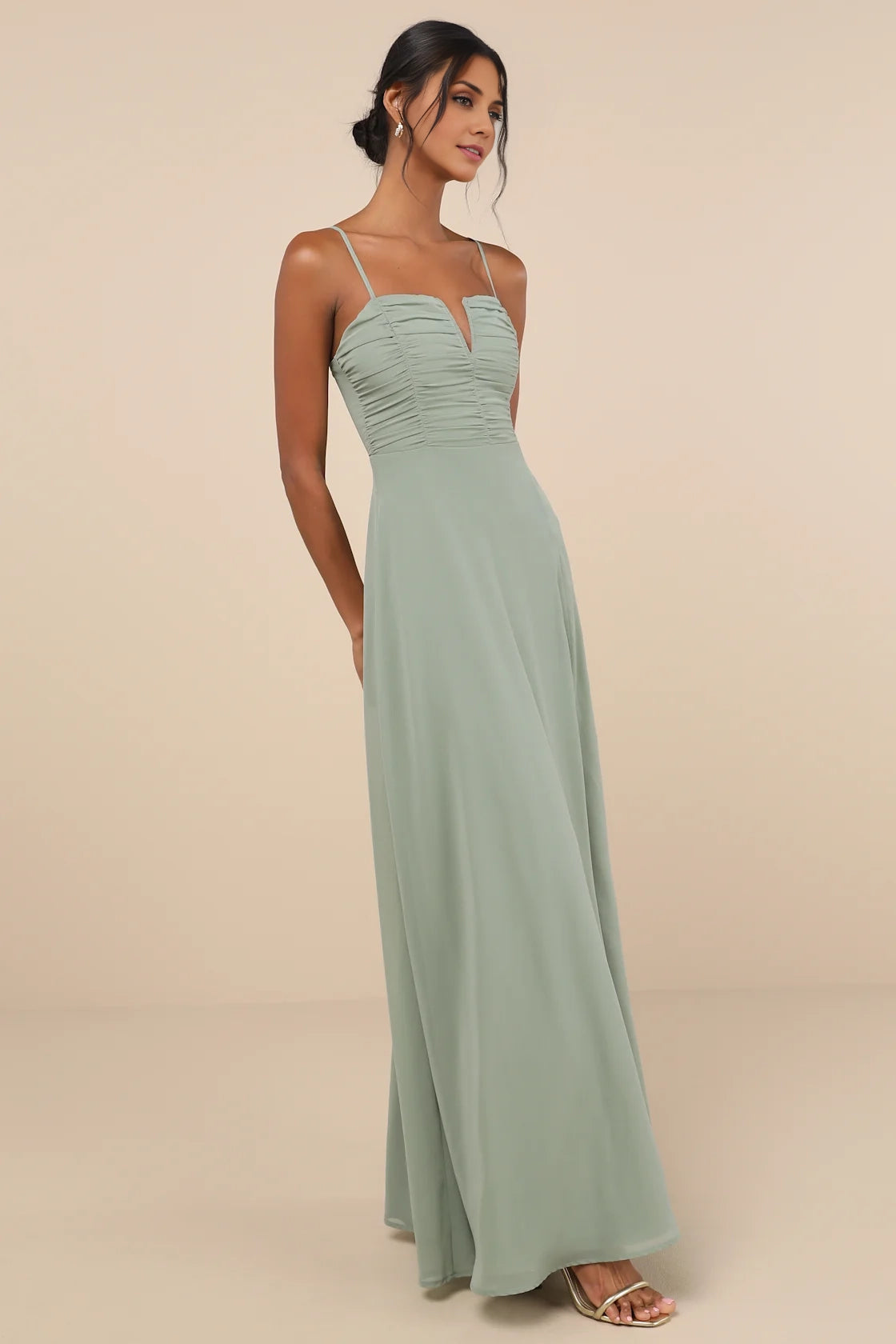 LANQI's playful A-line skirt with sheer chiffon sleeveless upper and slightly wrinkled Homecoming Dresses
