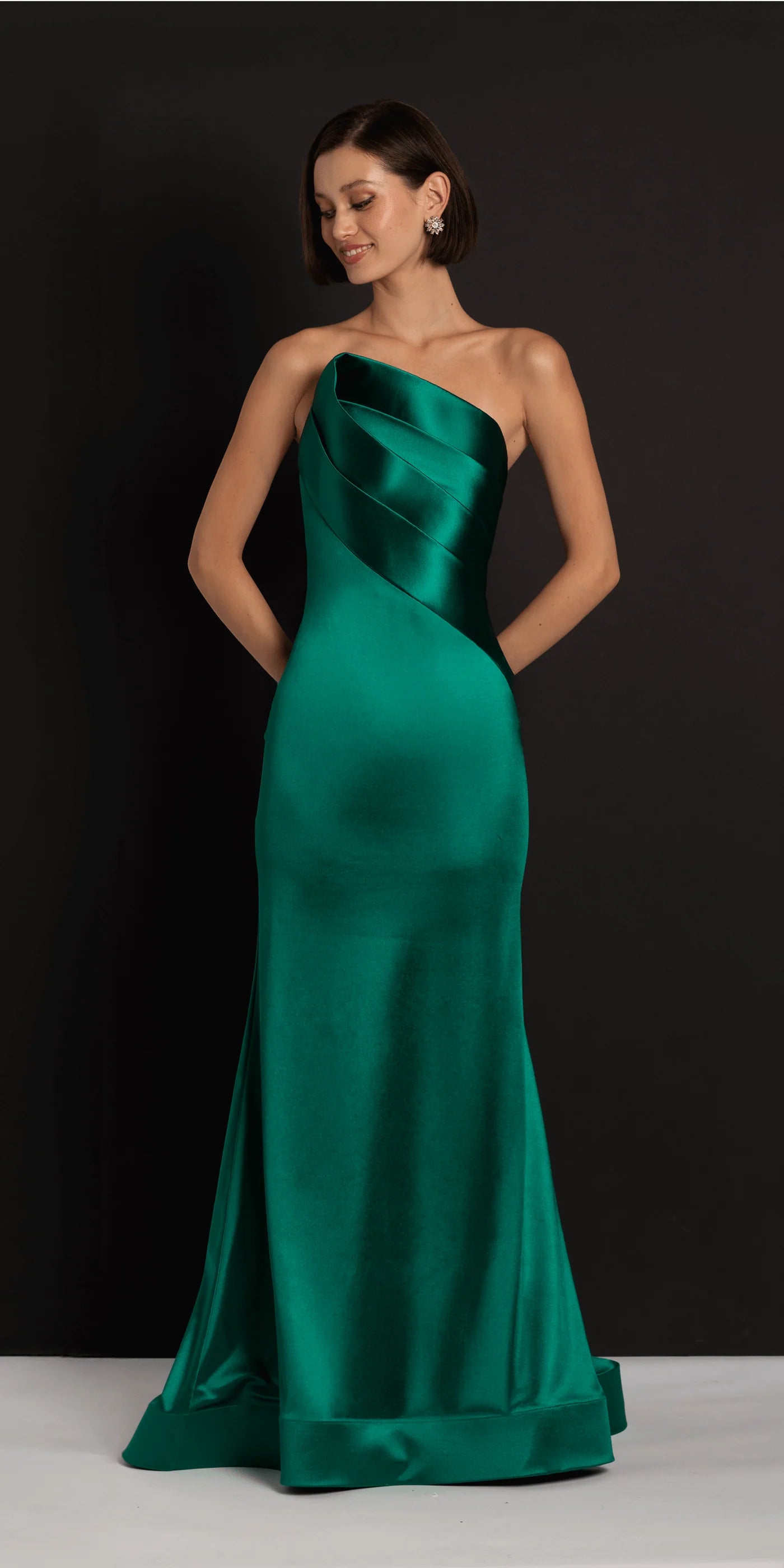 Sleek strapless satin evening dress with folded bodice detail, mermaid skirt and train