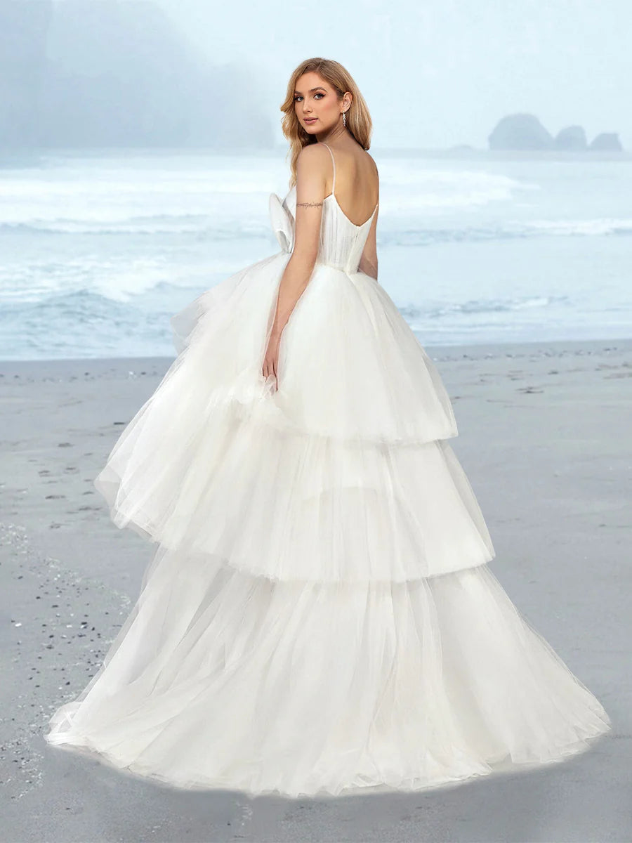 Spaghetti Strap V Neck Tulle Wedding Dress with Bow Decor Tiered Ruffle Sweep Train Bridal Gown