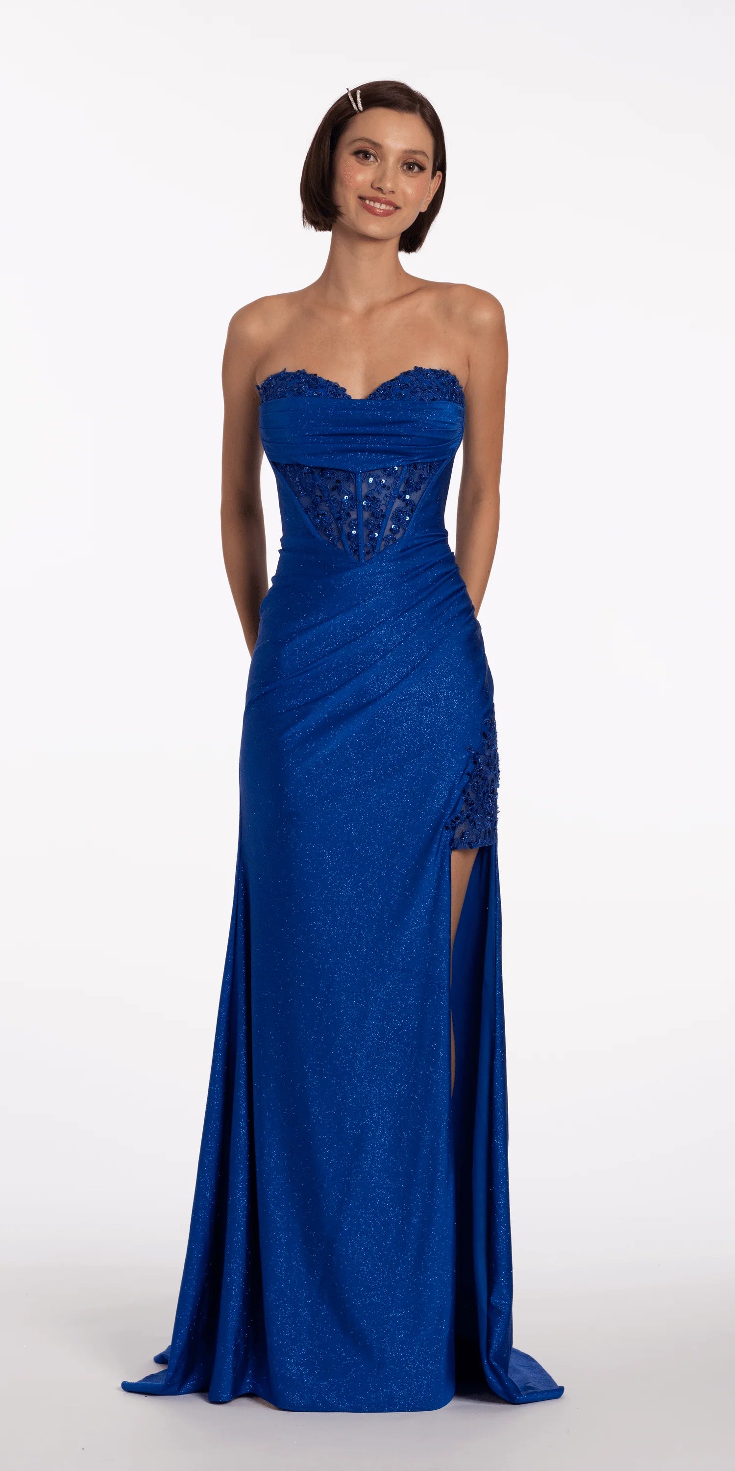 Striking royal blue glitter evening dress with strapless sweetheart neck, lace corset, and mermaid skirt with slit