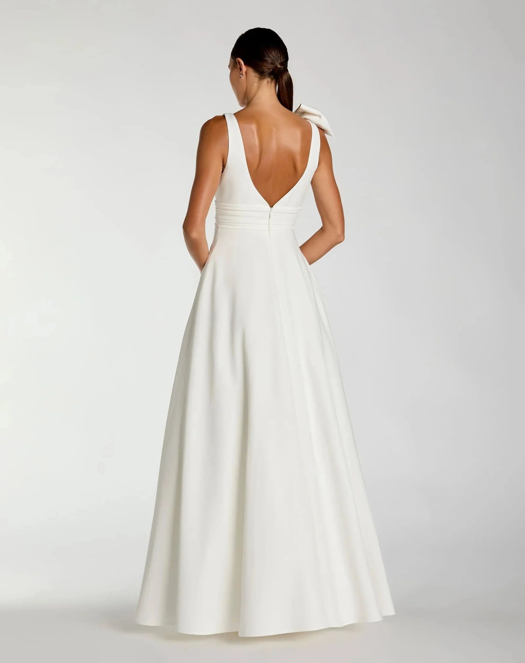 Structured crepe ballgown V-neck sleeveless bow-detail open-back floor-length evening dresses