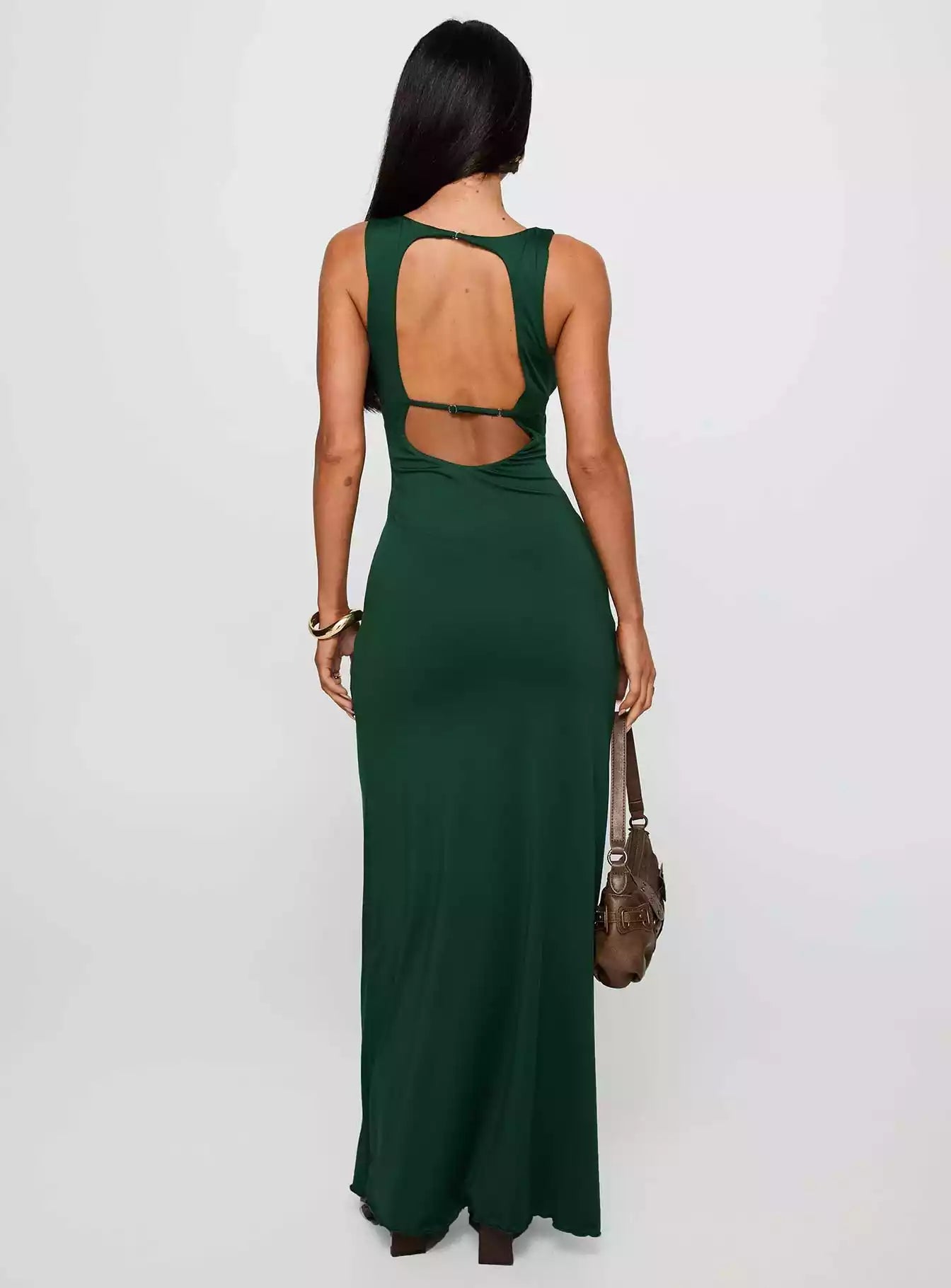 Stunning backless deep V-neck, front pleated details, ruffled hem, adjustable back straps, fully lined Prom Dresses